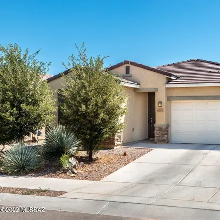 Rent this 3 bed house on 6591 East Via Jardin Verde in Wilmot, Tucson