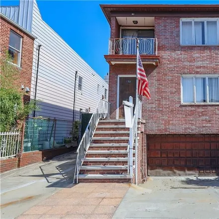 Buy this 6 bed townhouse on 1753 65th Street in New York, NY 11204