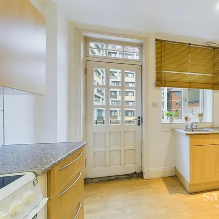 Rent this 3 bed apartment on Christopher Wren Yard in 113-119 High Street, London