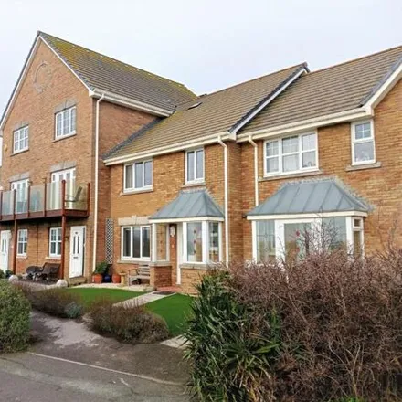 Rent this 3 bed townhouse on Rodwell Trail in Wyke Regis, DT4 9XS