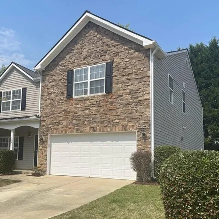 Buy this 4 bed house on 124 Carolina Town Lane in Holly Springs, NC 27540