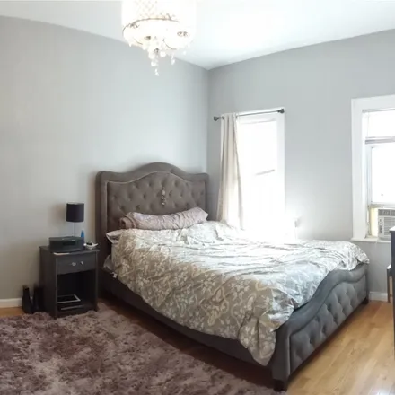 Buy this 3 bed house on 59-63 59th Street in New York, NY 11378
