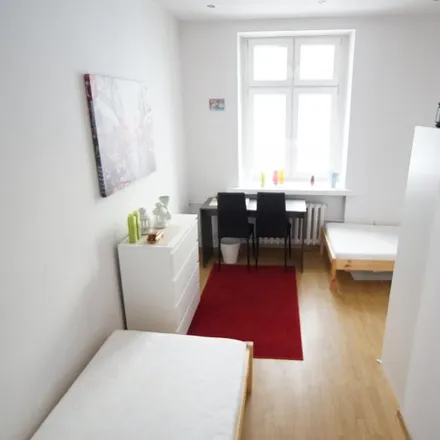 Rent this 5 bed room on Piotrkowska 69 in 90-102 Łódź, Poland