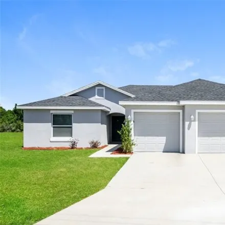 Rent this 4 bed house on 472 Brookfield Drive in Poinciana, FL 34758