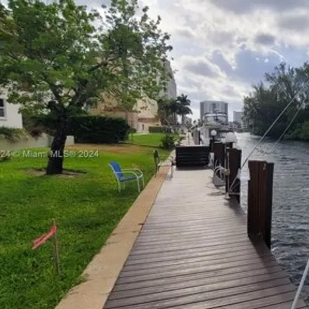 Rent this 2 bed condo on 2800 Northeast 28th Avenue in Country Club Isles, Pompano Beach