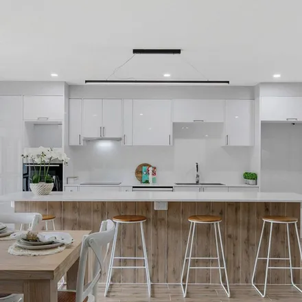Rent this 4 bed apartment on 77 School Road in Wynnum West QLD 4178, Australia