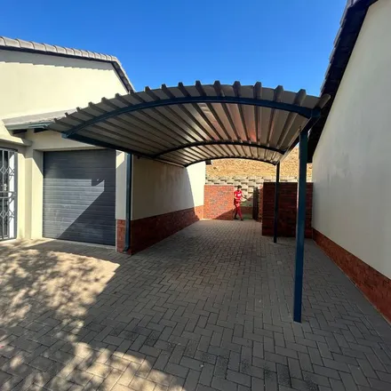 Rent this 3 bed townhouse on Sand Olive Close in Amberfield, Gauteng