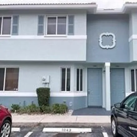 Rent this 2 bed house on 1967 Hibiscus Lane in Riviera Beach, FL 33404