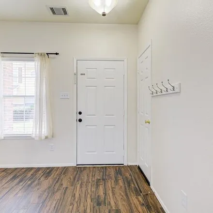 Rent this 3 bed apartment on 3907 Mossy Place Lane in Harris County, TX 77388