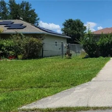 Rent this 4 bed house on 778 Camel Court in Polk County, FL 34759