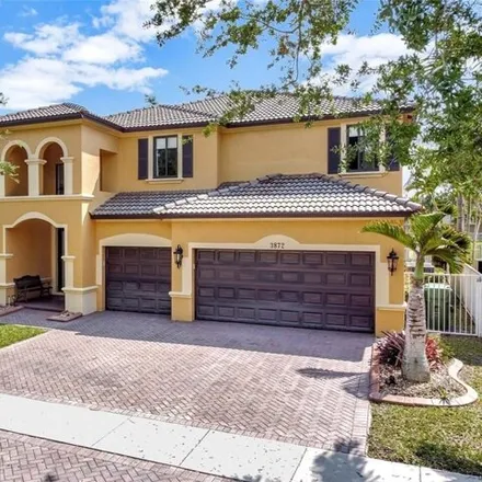 Buy this 5 bed house on 3872 West Hibiscus Street in Weston, FL 33332