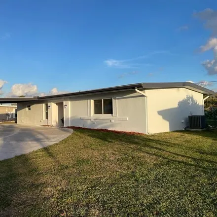Buy this 3 bed house on 2476 Aquilos Court in Port Charlotte, FL 33952