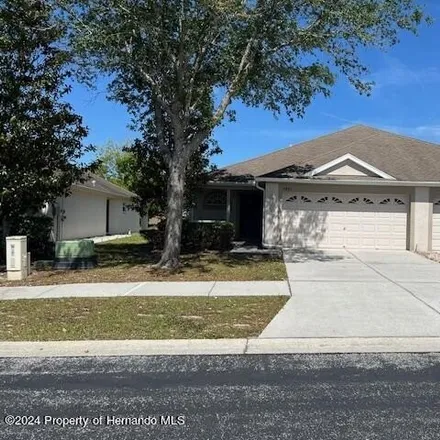Rent this 3 bed house on 3903 Crossline Drive in Spring Hill, FL 34609