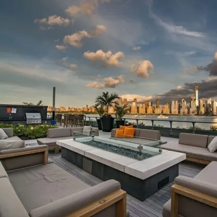 Buy this 2 bed condo on Nine on the Hudson in Avenue at Port Imperial, West New York