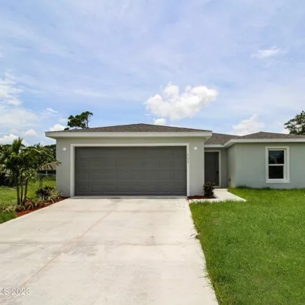 Buy this 3 bed house on 582 Estes Avenue Southwest in Palm Bay, FL 32908