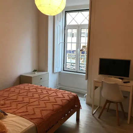 Rent this 6 bed room on Rua Visconde de Santarém 40 in 1000-268 Lisbon, Portugal