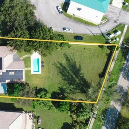 Buy this 4 bed house on 6178 Falconsgate Avenue in Davie, FL 33331