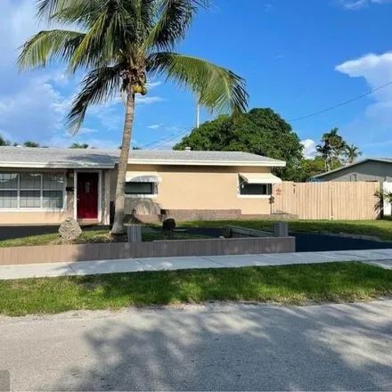 Rent this 3 bed house on 3450 NE 10th Ter in Pompano Beach, Florida
