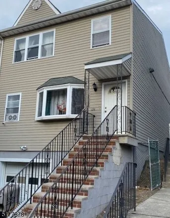 Buy this 7 bed townhouse on 152 Sherman Avenue in Paterson, NJ 07502