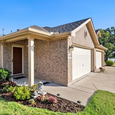 Buy this 2 bed townhouse on 2421 Ravenwood Court in Mansfield, TX 76063