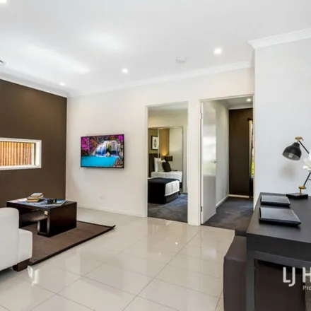 Rent this 4 bed apartment on Mason Street in Yarrabilba QLD, Australia