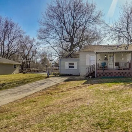 Buy this 3 bed house on 1438 East Nora Street in Springfield, MO 65803