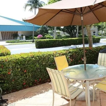 Rent this 2 bed condo on Saint Ann Catholic Church in 987 3rd Street South, Naples