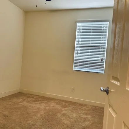 Rent this 4 bed apartment on 9588 West Cashman Drive in Peoria, AZ 85383