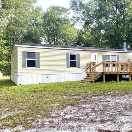 Buy this studio apartment on 11460 Southwest Tustenuggee Avenue in Columbia County, FL 32038