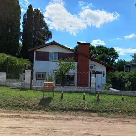 Buy this 3 bed house on Paseo 112 in Partido de Villa Gesell, Villa Gesell
