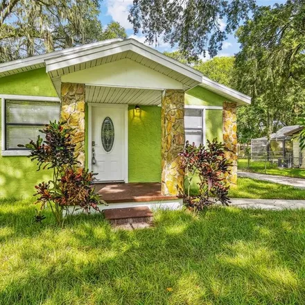 Buy this 4 bed house on 6614 North 23rd Street in Tampa, FL 33610