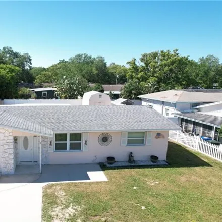 Buy this 3 bed house on 1033 Jackmar Road in Dunedin, FL 34698