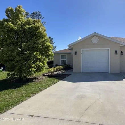 Rent this 3 bed house on 19 Freneau Lane in Palm Coast, FL 32137