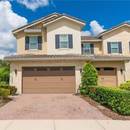 Buy this 3 bed townhouse on 14074 Millington Street in Orange County, FL 32832