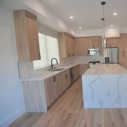 Rent this 4 bed house on 10812 Peachgrove Street in Los Angeles, CA 91601