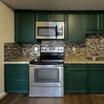 Rent this 3 bed apartment on #c,2617 Grant Street in Neartown - Montrose, Houston