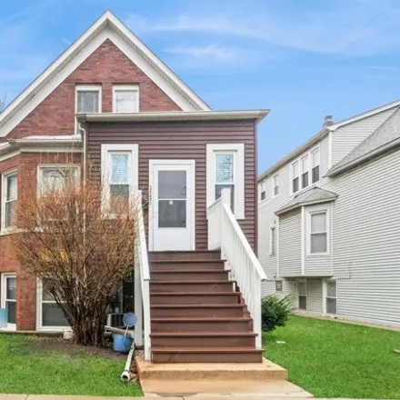 Buy this 4 bed house on 2925 West Roscoe Street in Chicago, IL 60618