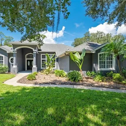 Buy this 4 bed house on 12214 Treetop Court in Orange County, FL 32832