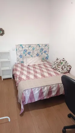 Rent this 5 bed room on Madrid in Calle Virgen del Puig, 28027 Madrid