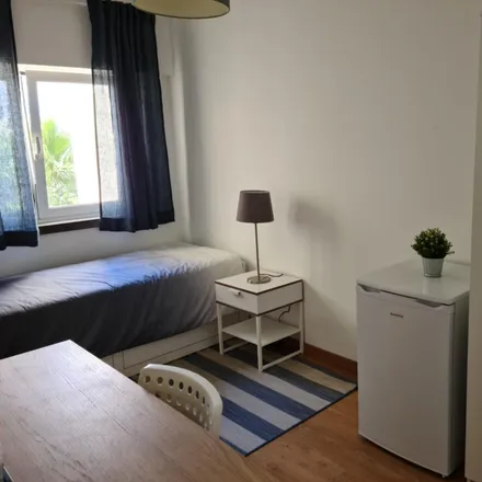 Rent this 3 bed room on Rua Francisco António da Silva in 2780-052 Oeiras, Portugal