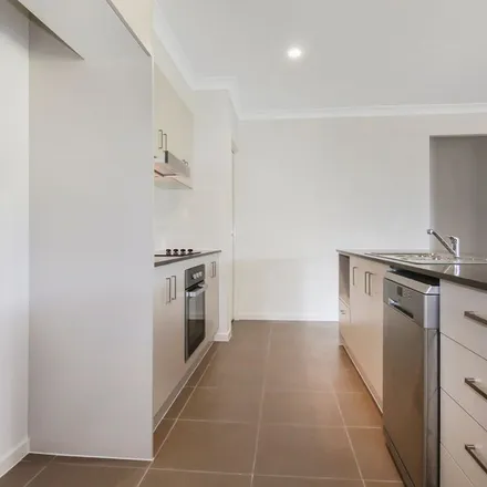 Rent this 4 bed apartment on Ellerton Avenue in Dillans Scrub NSW 2334, Australia
