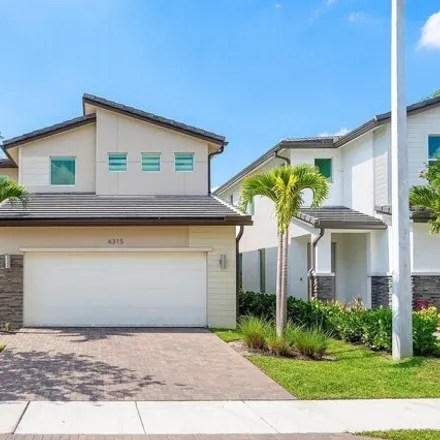 Buy this 4 bed house on Banyan Creek Elementary School in Satin Leaf Court, Delray Beach