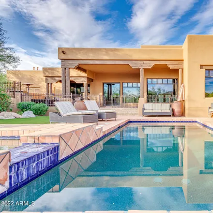 Buy this 4 bed house on 9290 East Thompson Peak Parkway in Scottsdale, AZ 85255