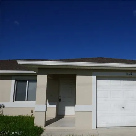 Buy this 3 bed house on 1427 NE 8th Pl in Cape Coral, Florida