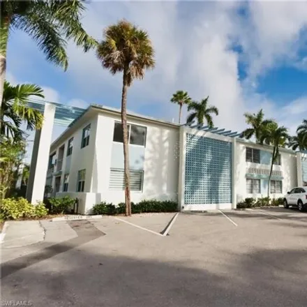 Rent this 2 bed condo on Mariner Apartments Motel in 13th Avenue South, Naples