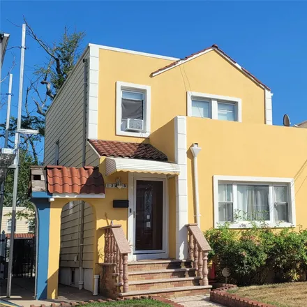 Buy this 3 bed house on 134-35 230th Street in New York, NY 11413