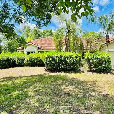Buy this 4 bed house on 5074 Northwest 98th Drive in Westview Village, Coral Springs
