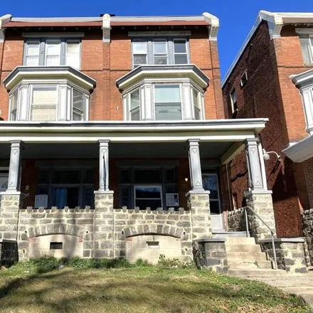 Buy this 4 bed house on 5033 Walnut Street in Philadelphia, PA 19139