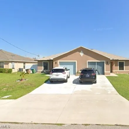 Rent this 3 bed house on 1631 Southwest 34th Street in Cape Coral, FL 33914