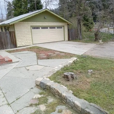 Rent this 3 bed house on 22986 Bryon Road in Valley of Enchantment, Crestline